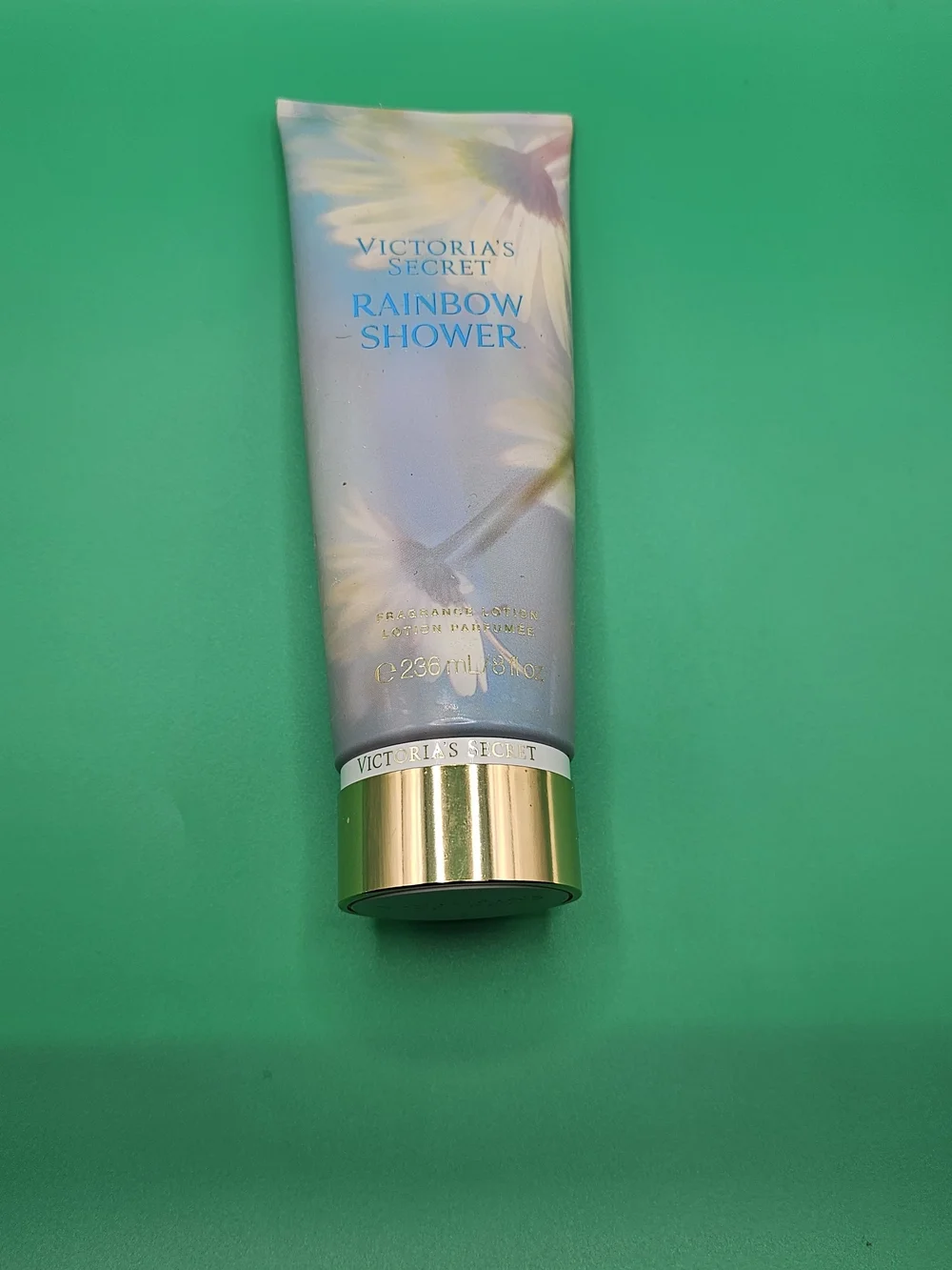 Victoria's Secret Rainbow Shower Fragrance Lotion - Light Blue with Gold Cap